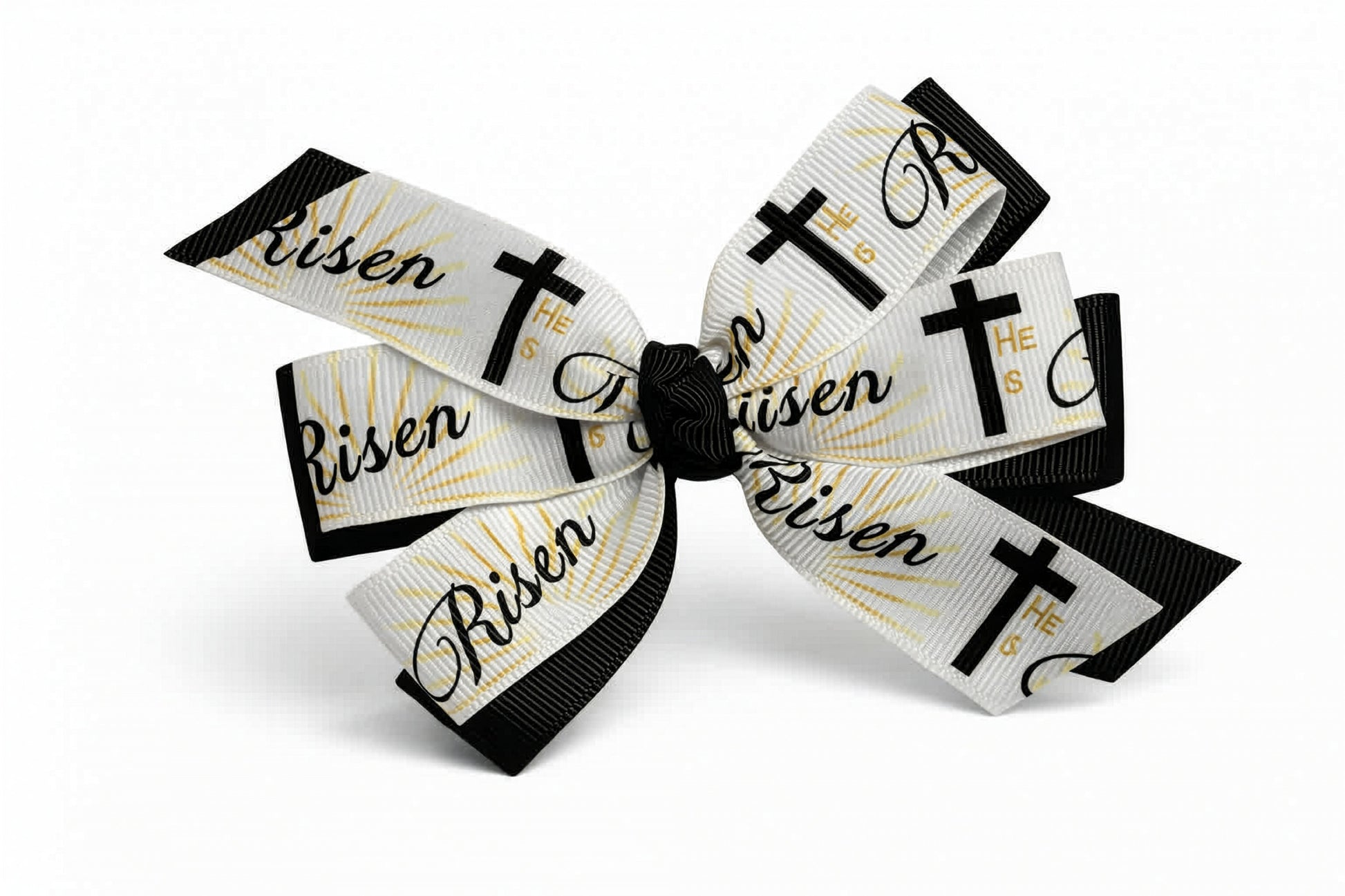 Bow with 'Risen' and cross designs on a white background