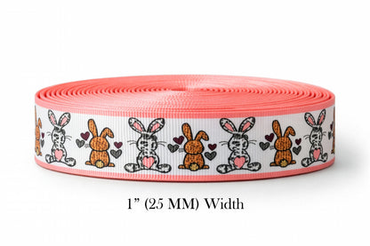 Roll of ribbon with bunny designs on a white background